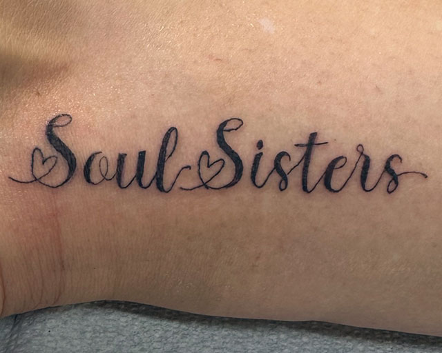 Lettering Font and Script Tattoo that says Soul Sisters