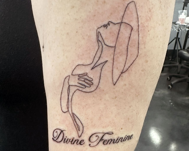 Lettering Font and Script Tattoo of a silhouette and a person's name