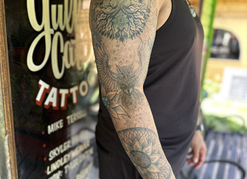 Video of full sleeve geometric tattoo